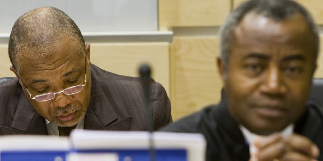 Image of former Liberian president Charles Taylor seated at the International Criminal Court. 