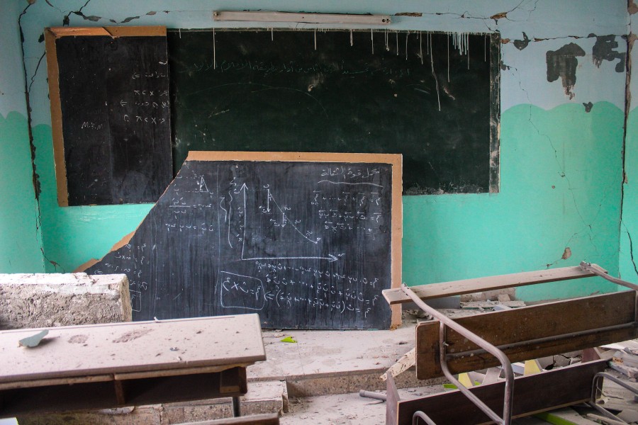 Image of a dislodged and broken blackboard, still shows lessons from a math class held at a secondary school in Atarib. Russian air forces bombed the school on Nov. 13, 2016