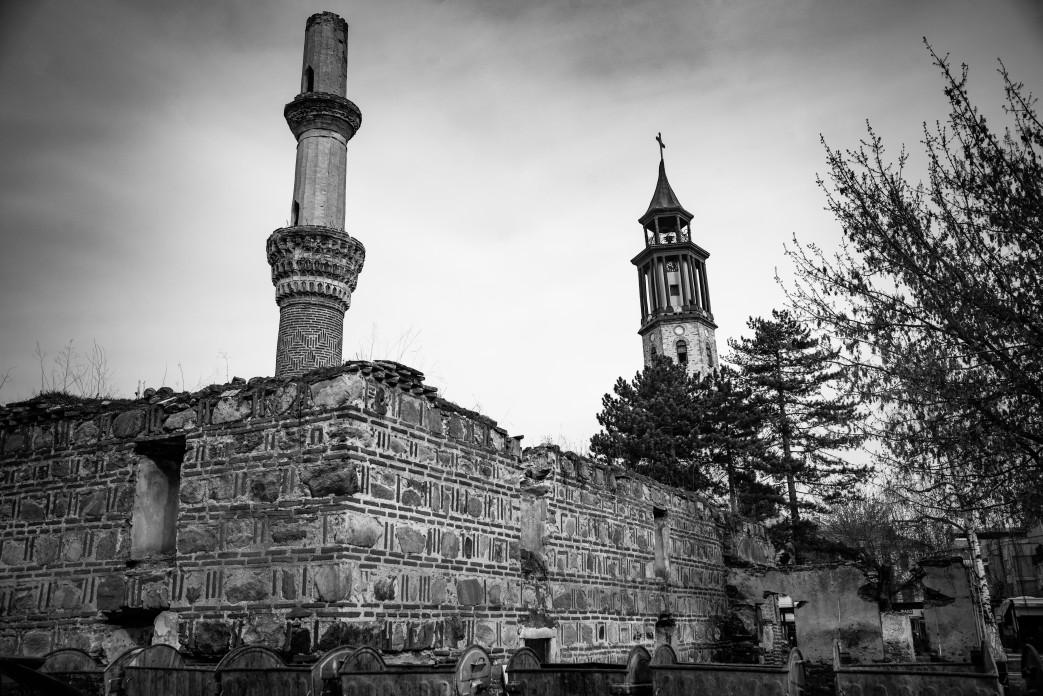 The exterior of a stone mosque.