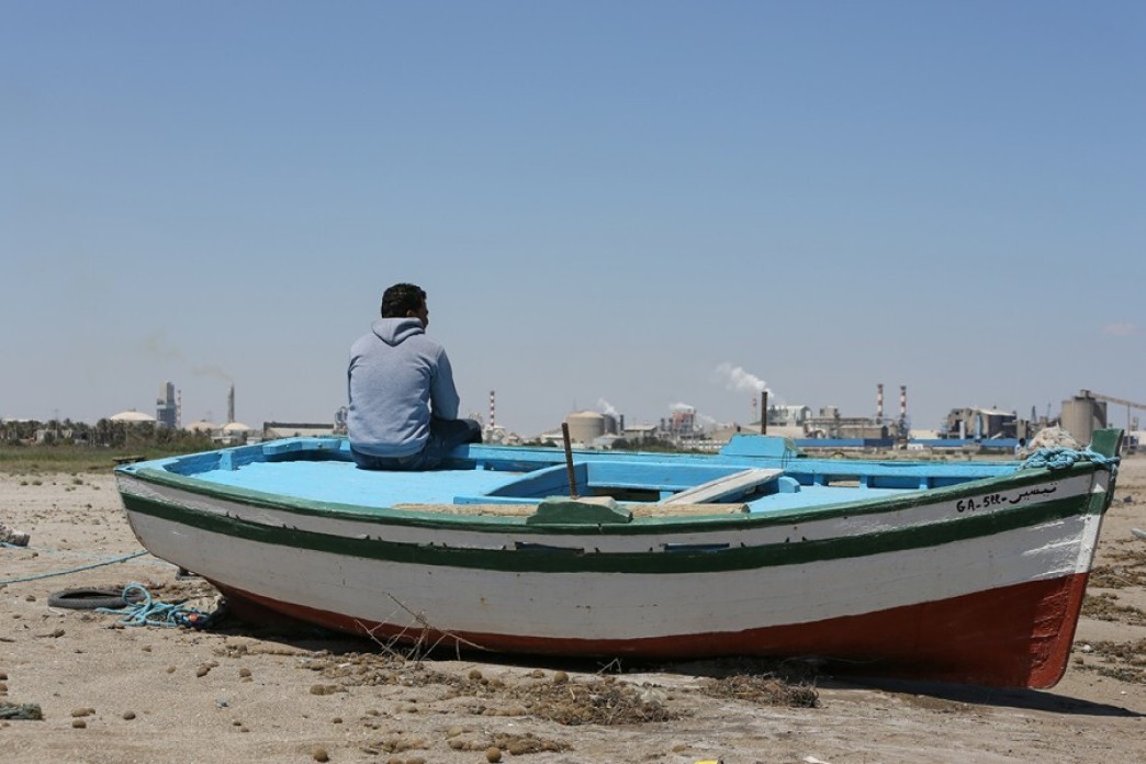 No longer useful, some boats have been abandoned on shore.