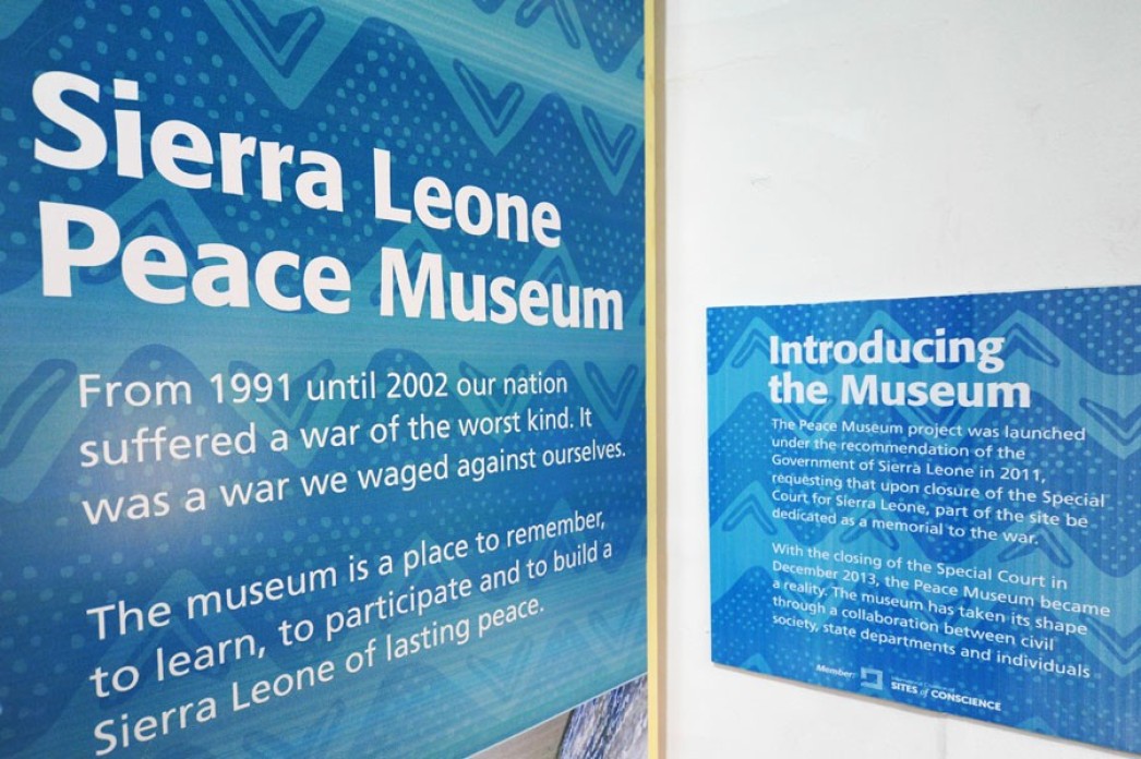 Museum plaques on the wall.