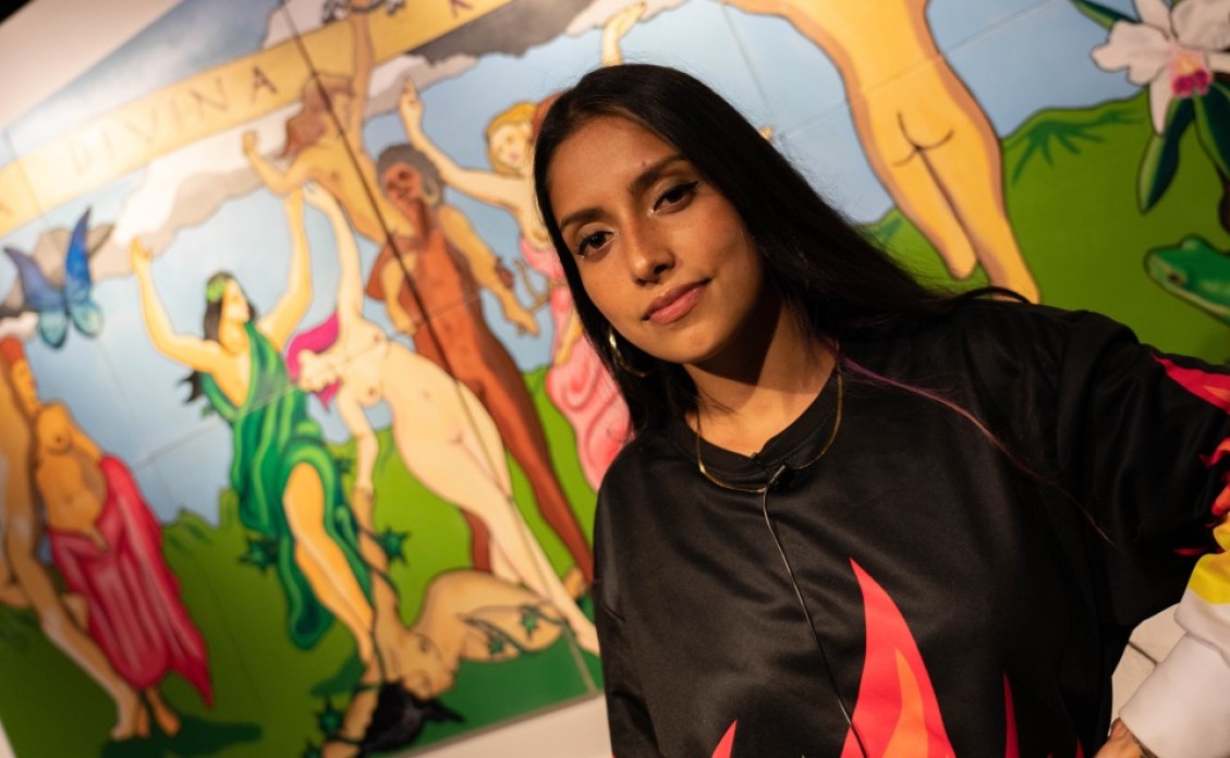An artist on a colorful background