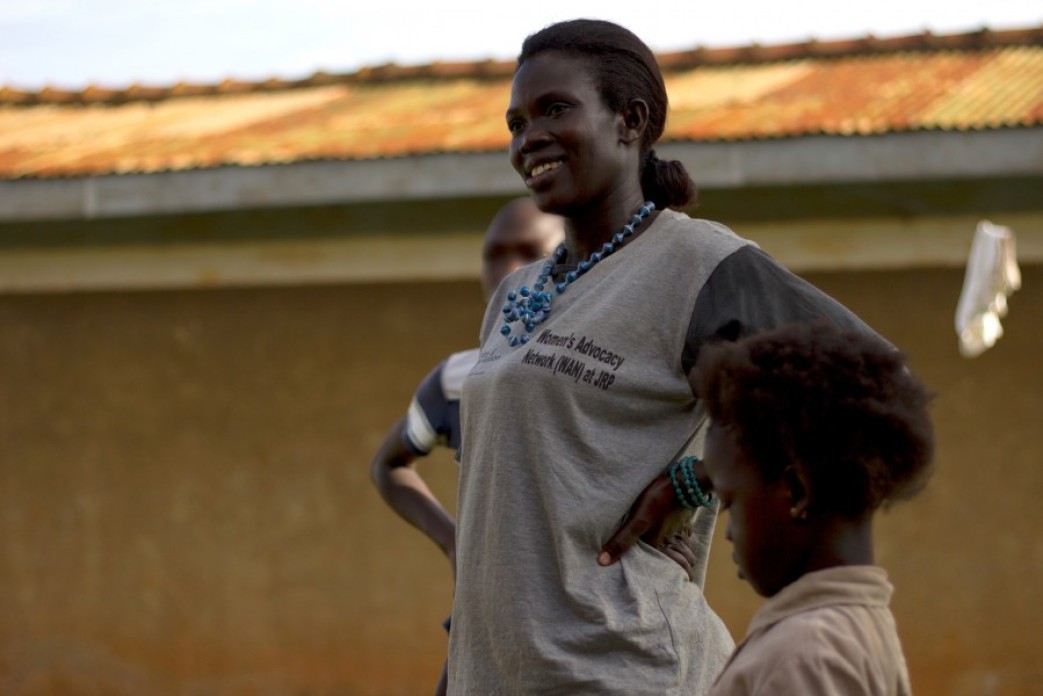 A woman standing assertively.