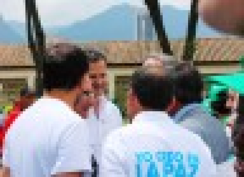 Men gathered talking.