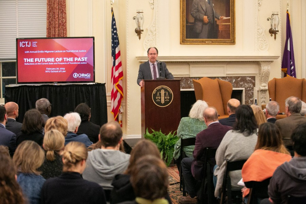 A man delivering a lecture.