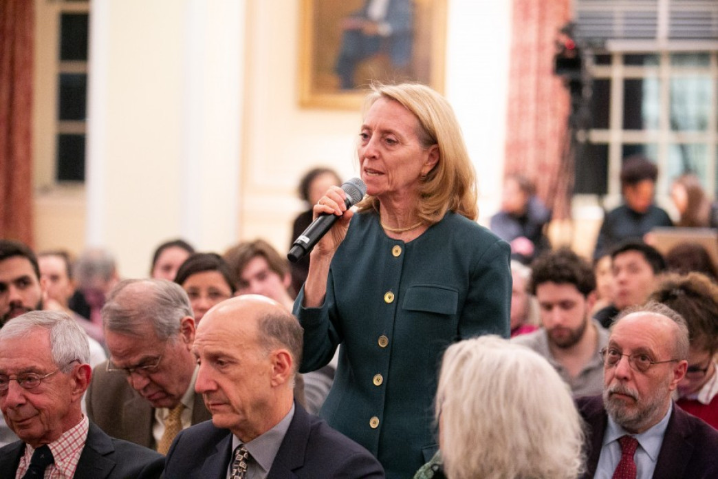 A woman asking a question.