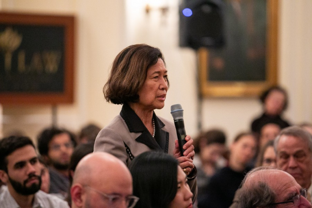 A woman asking a question.